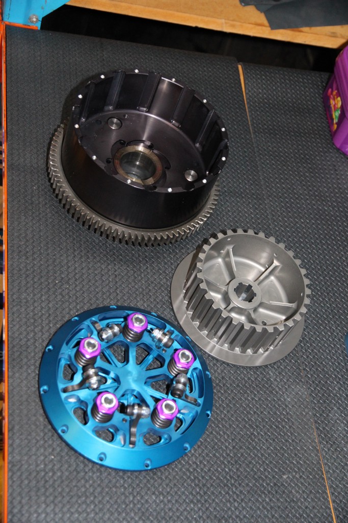 FROM THE TOP: Clutch basket, inner hub and slider hat and pressure plate. Anodised MTC billet goodness.