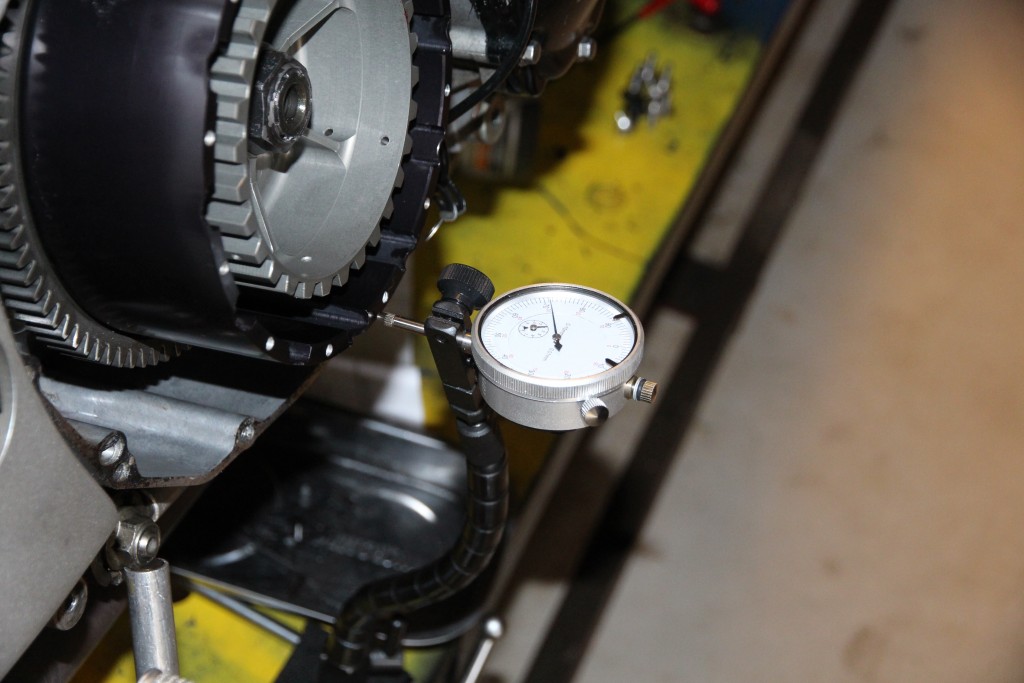 Dial gauge used to measure end float of clutch outer basket.